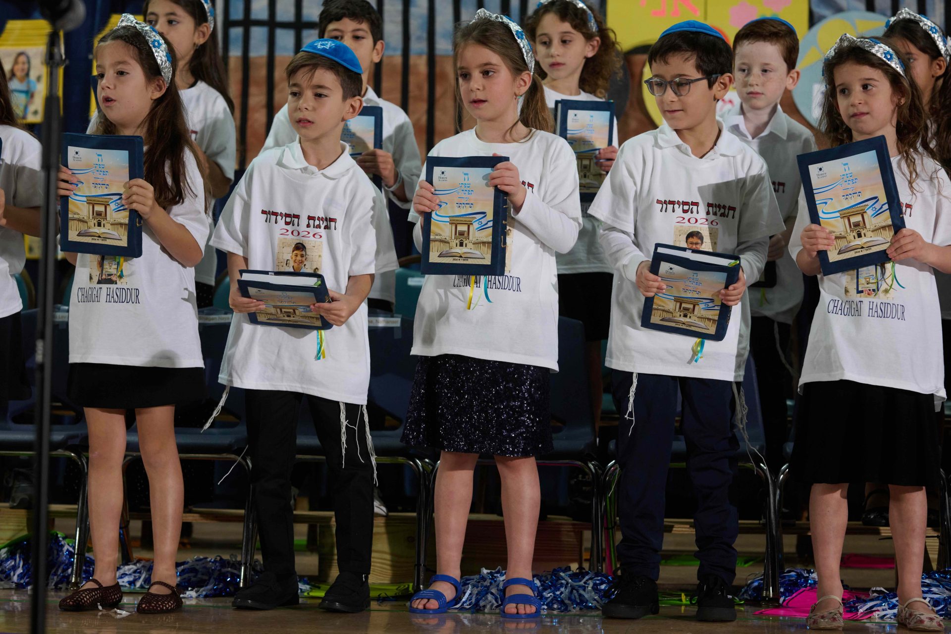 Mazal Tov to our First Graders on Receiving their Siddurim