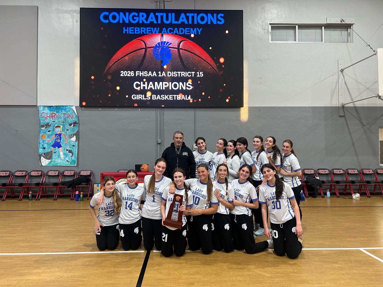 Lady Warriors are Back to Back District Champions after Defeating Sheridan Hills 52-31